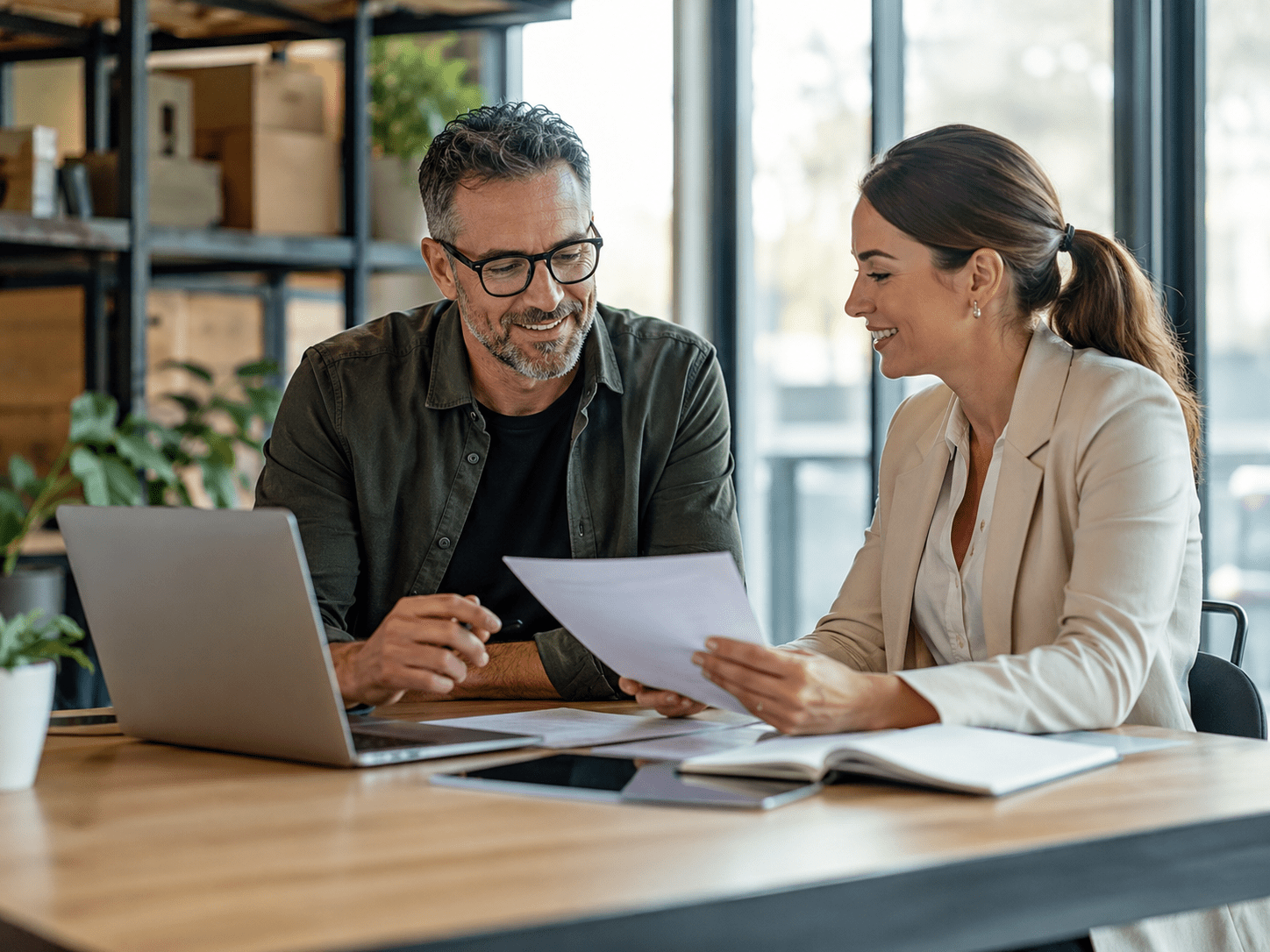 Business owner discussing business loan and finance options with a finance broker in Ipswich.